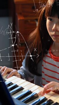 Mathematical equations floating against girl playing the piano