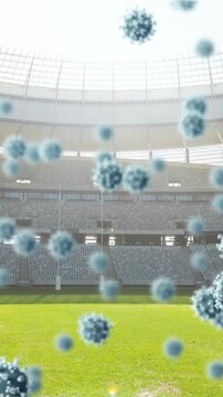 Covid-19 cells against empty sports stadium