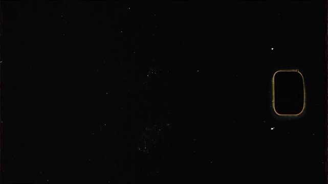 Vintage 16mm Film Grain Texture Overlay with Authentic Spool Hole Footage for Cinematic Retro Video Editing Effects
