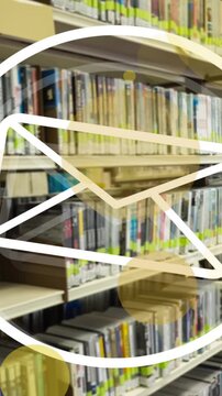 Animation of envelope icon and light spots over bookcase in library
