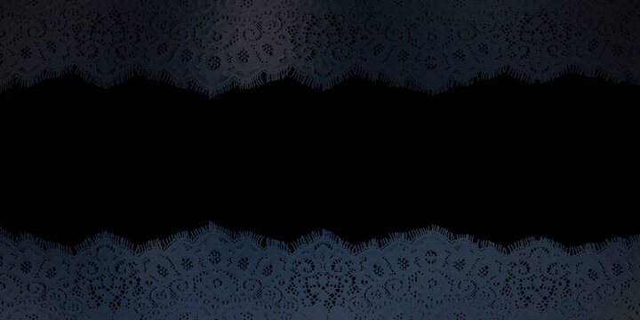 Dark background with delicate lace borders at top and bottom.
