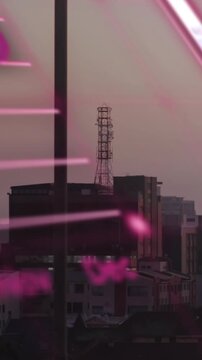 Animation of statistical data processing against aerial view of cityscape