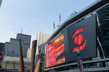 Fototapeta premium exterior building facade and digital billboard (for ScotiaClub) outside MLSE's Scotiabank Arena (Maple Leaf Square entrance), Toronto