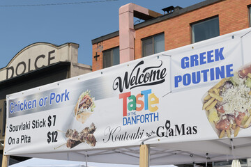 Fototapeta premium banner at Taste of the Danforth outside Koutouki GiaMas, a Greek taverna, located at 424 Danforth Av, Greektown, Toronto