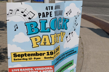 Fototapeta premium 4th annual Pape Village block party sign in Toronto