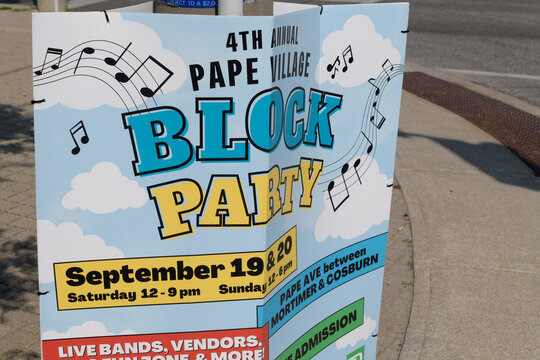 4th annual Pape Village block party sign in Toronto