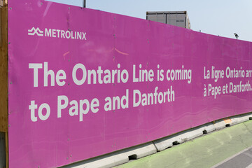 Fototapeta premium Metrolinx construction hoarding at the Ontario Line station, Pape and Danforth, Toronto