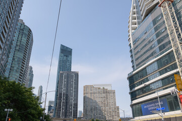 Fototapeta premium looking north on Yonge St from about Harbour St with (at right) SkyTower by Pinnacle International and condominium complexes, Toronto