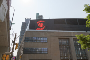 Fototapeta premium facade of the old Canada Post Delivery Building with Scotiabank corporate logo outside Scotiabank Arena at 40 Bay St, Toronto