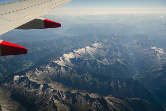 Switzerland, July 25, 2026: Aerial view of rugged Swiss Alps mountain landscape with valleys and alpine terrain, travel and tourism