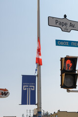 Fototapeta premium traffic signs and street signs in Greek Town, Toronto