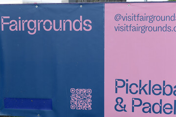 Fototapeta premium tarp banner sign near Fairgrounds, a public racket club, located at 849 Eglinton Av E, Toronto