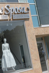 Fototapeta premium Vogue Sposa Bridal Boutique facade and mannequin in display window at 304 Danforth Av, Toronto