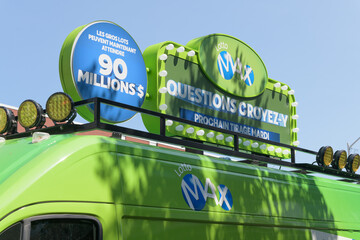 Fototapeta premium detail of OLG (Ontario Lottery and Gaming Corporation) promotional/marketing vehicle for LOTTO MAX at Taste of the Danforth 2026, Toronto
