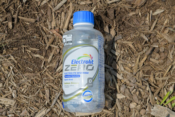 Fototapeta premium discarded bottle of Electrolit ZERO, a zero-sugar, zero-calorie electrolyte/hydration drink in Toronto