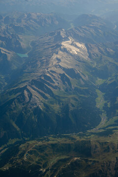 Switzerland, July 25, 2026: Aerial view of rugged Swiss Alps mountain landscape with valleys and alpine terrain, travel and tourism