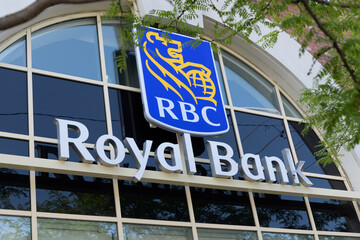 Fototapeta premium corporate logo and sign on the exterior of RBC Royal Bank located at 45 Wicksteed Av, SmartCentres, 45 Wicksteed Av, East York Toronto