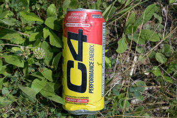 Fototapeta premium discarded can of C4 energy drink on the ground in Toronto (beverage produced by Cellucor; owned by Nutrabolt)
