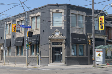 Fototapeta premium exterior building facade and sign of Lea-Ann Belter Bridal located at 238 Broadview Av, Toronto