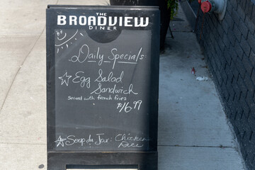 Fototapeta premium street chalkboard sidewalk sign at The Broadview Diner located at 757 Broadview Av, Toronto
