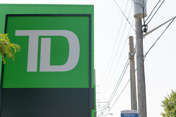 Fototapeta premium close-up of TD sign outside a branch located at 991 Pape Av (East York), Toronto