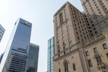 Fototapeta premium TD Terrace and the Châteauesque Fairmont Royal York at 100 Front St W, Toronto, designed by Ross and Macdonald (with Sproatt and Rolph) for the Canadian Pacific Railway as a grand hotel