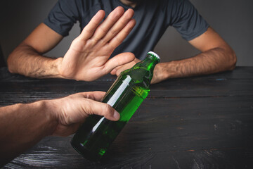 Naklejka premium Caucasian man reject alcohol. No drinking