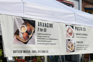Fototapeta premium large food menu banner near IL FORNELLO on Danforth, an Italian restaurant, located at 576 Danforth Av, Toronto