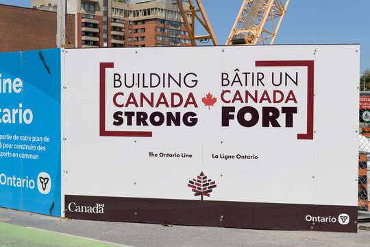 spanking new Gov of Canada Building Canada Strong sponsor hoarding sign outside Pape station Ontario Line/Line 2, Toronto
