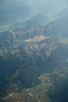 Aerial view of rugged Swiss Alps and glacial valleys