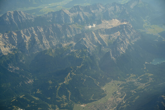 Aerial view of rugged Swiss Alps and glacial valleys