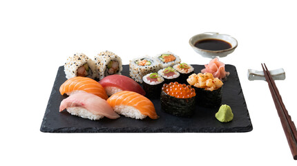 Assorted fresh sashimi and nigiri sushi rolls served on a black stone plate with chopsticks © PixelAura