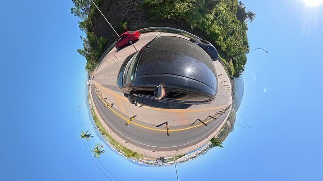 Car driving up the mountain on the Tamoios Highway, on the North Coast of S&atilde;o Paulo state.