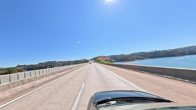 A car driving over the Atibainha Reservoir in Nazar&eacute; Paulista, on the Dom Pedro I Highway in the state of S&atilde;o Paulo.