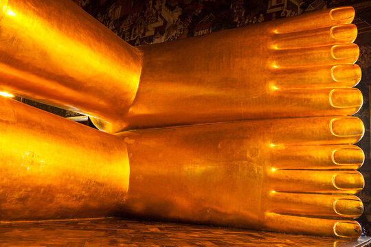 A reclining Buddha statue feet close up. Wat Pho, Bangkok, Thailand