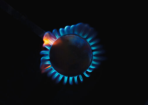 Real gas flame from above isolated on black background