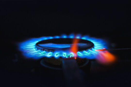 Real gas flame from above isolated on black background