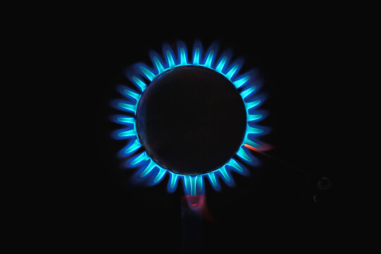 Real gas flame from above isolated on black background