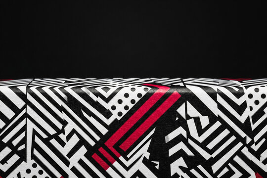 Abstract geometric pattern with black white and red lines