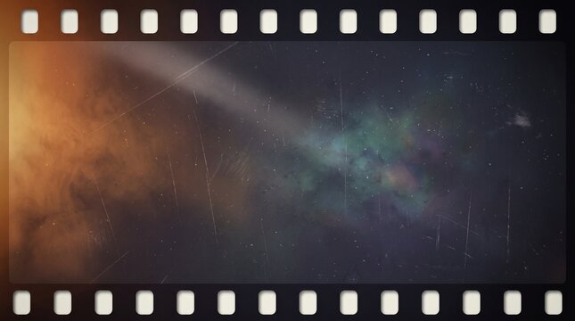 Abstract film frame with scratched texture and colorful nebula space background art