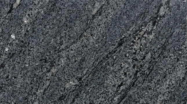 Close-up of textured dark asphalt surface with cracks and granules for urban road and nature environment design