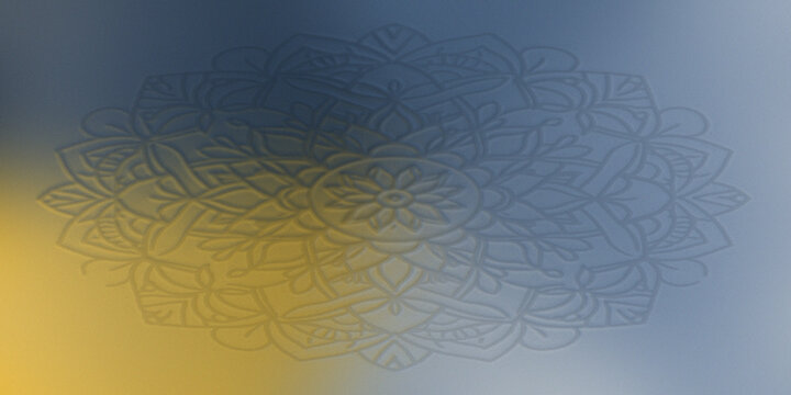 Embossed mandala pattern in blue and yellow hues for a serene decorative background.