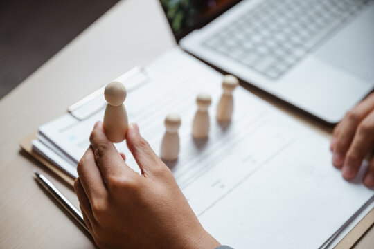 human resources development with resume career; paperwork and a growth concept arranged on a desk. human guides buyer choices, resources frames the scene, and development adds useful meaning.