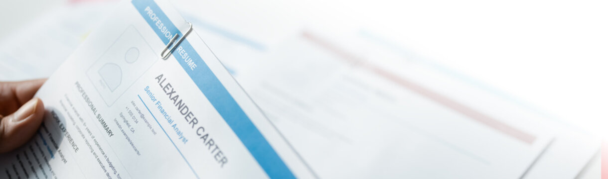 resume human resources with employment recruiting; a resume document on a bright office desk. resume guides buyer choices, human frames the scene, and resources adds useful meaning.