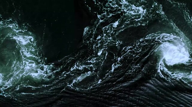 River and sea waves meet and create a dynamic natural water boundary.