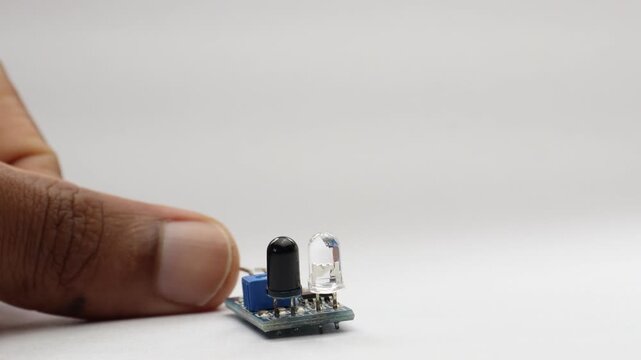 Close up of an infrared sensor module showing the emitter and receiver LEDs used for obstacle detection