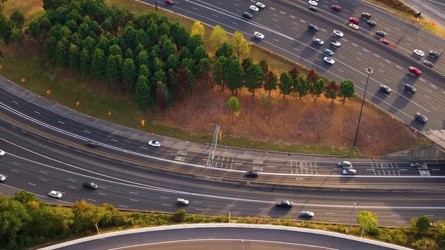 American freeway in city area. Atlanta downtown highway network with toll roads and heavy traffic showing logistics and urban circulation.