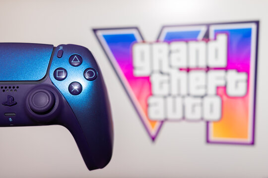 YEREVAN, ARMENIA - 08.11.2026: Sony PlayStation 5 DualSense controller with the official Grand Theft Auto VI artwork and logo in the background