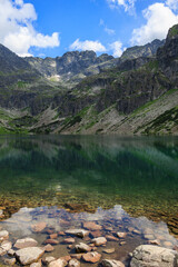 Czarny Staw Gąsienicowy, Alpine Lake, Tatra Mountains, Poland – Vertical View. Lake in the Polish Tatra Mountains. Tatra National Park. © Tati