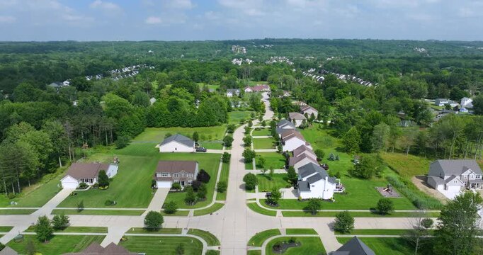 View from above of residential houses in living area in Cleveland, Ohio. American dream homes as example of real estate development in US suburbs.
